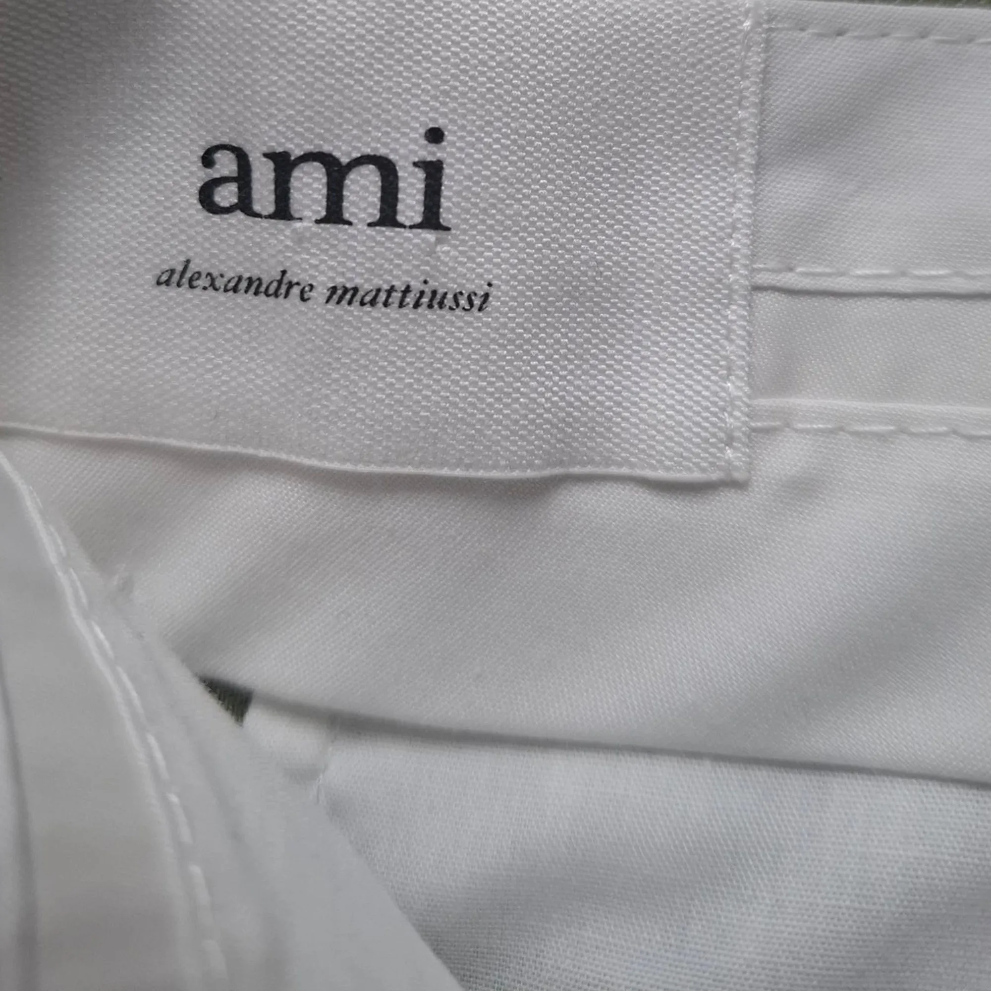 AMI Paris Plissierte Weitbein-Hose aus grüner Viskose