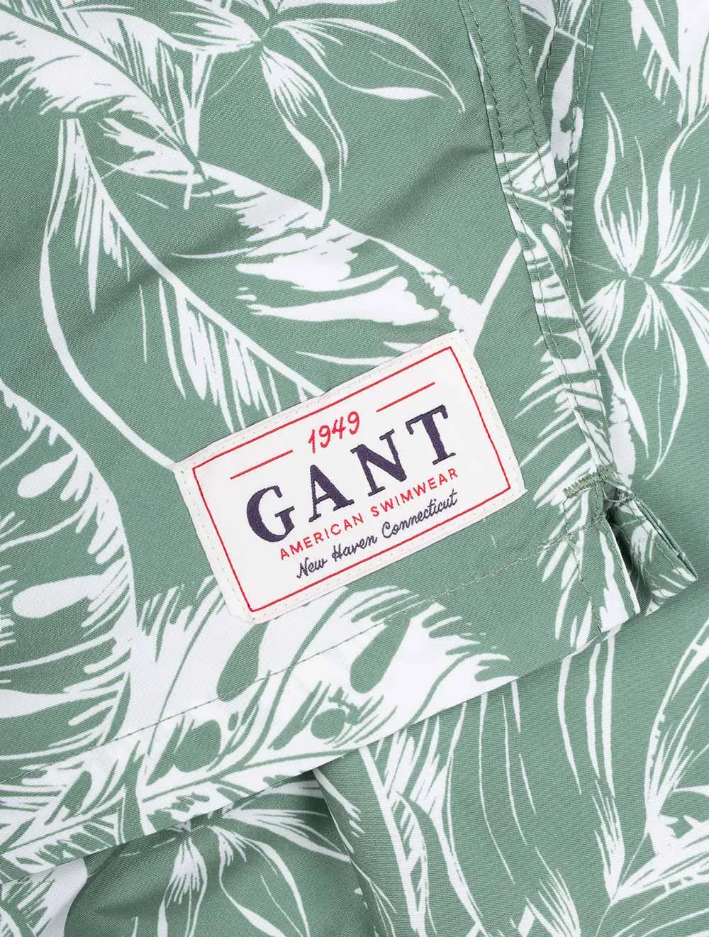 Klassische Passform Kurzshorts mit Tropenblatt-Print in Kalamata-Grün