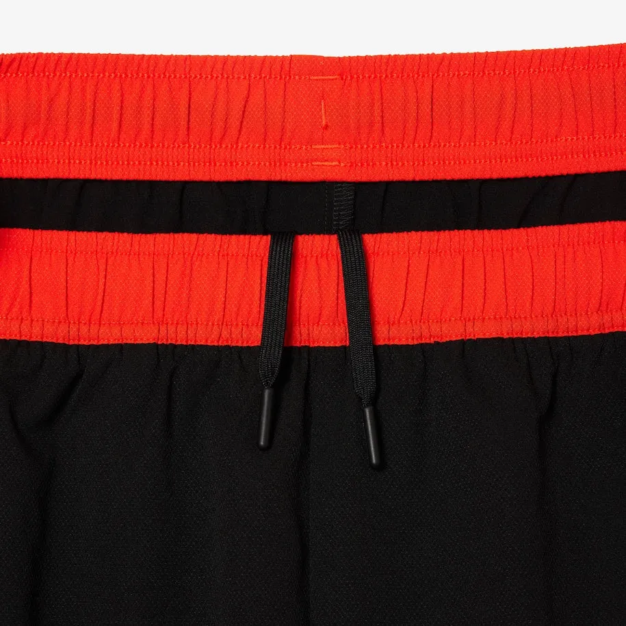 Herren Stretch Tennis Shorts Schwarz / Orange Patagonia Kleidung